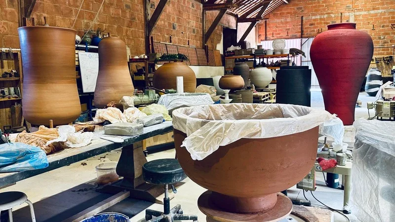 Ceramic Factory studio with several large artworks in production