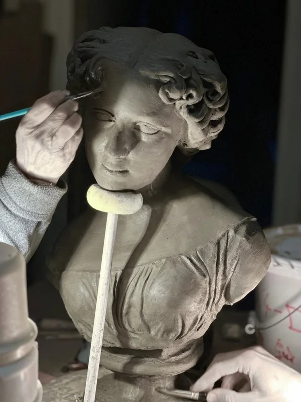 Hand-shaping a monumental ceramic artwork