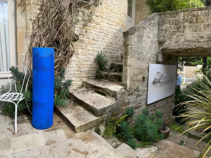 Blue TUBUS I beside stone steps